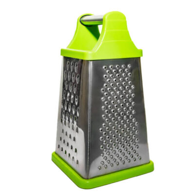 Green hand grater for vegetables isolated on a white background