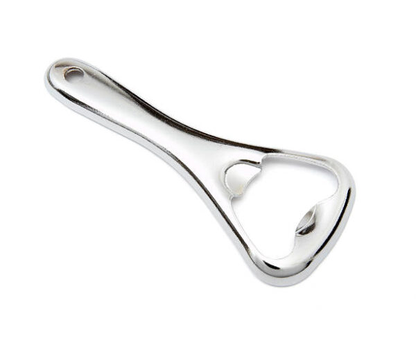 Close up of kitchen bottle opener on white background with clipping path