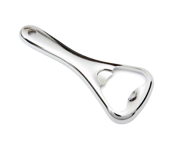 Close up of kitchen bottle opener on white background with clipping path