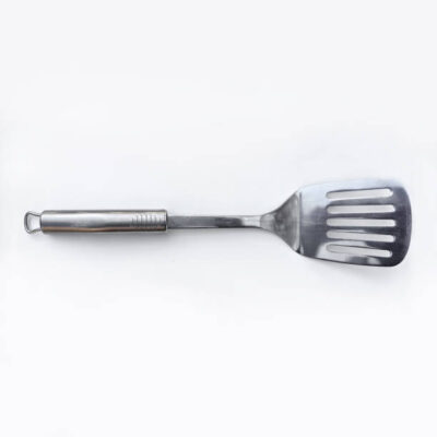 Directly above shot of spatula on white background