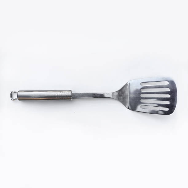Directly above shot of spatula on white background